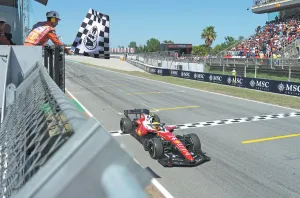 Hamilton celebrates maiden win with Ferrari